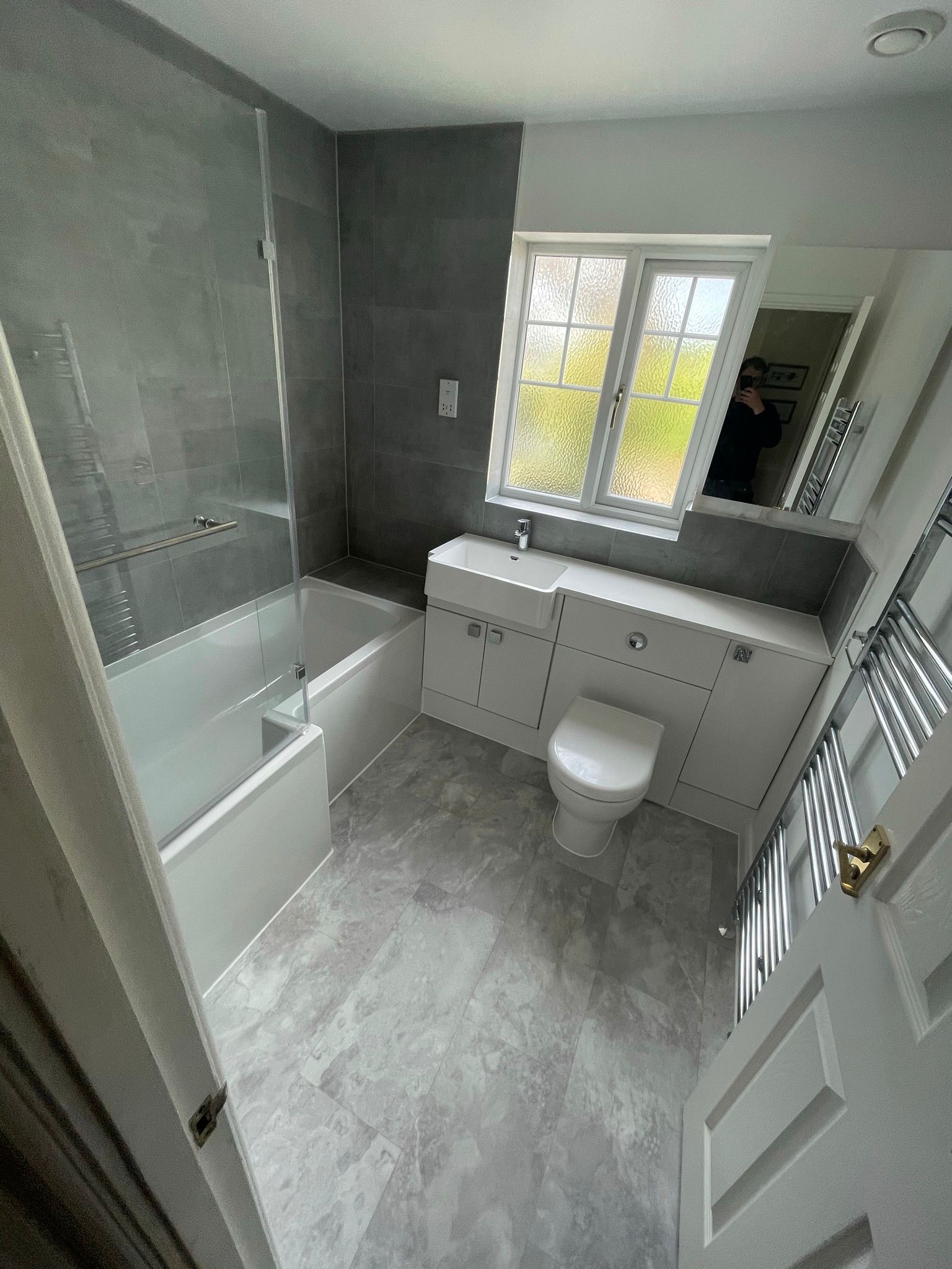 Grey bathroom with modern fixtures